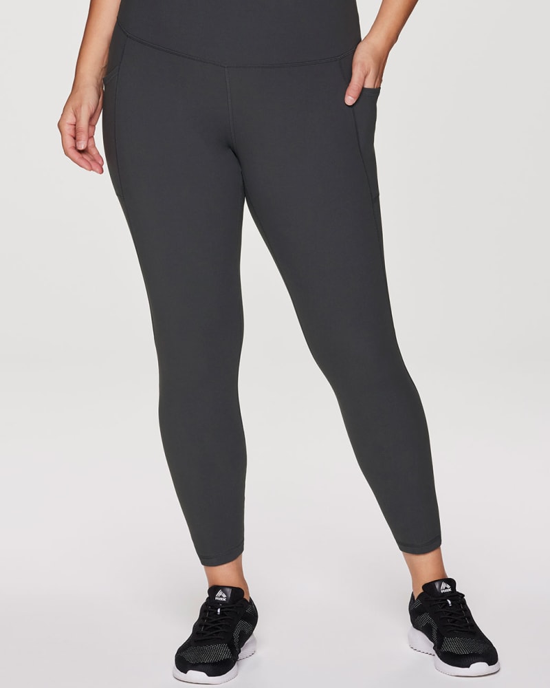 Front of a model wearing a size 3X Super Soft Ultra Hold Legging in Charcoal by RBX Active. | dia_product_style_image_id:315815
